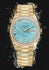 Rolex Oyster Perpetual Yellow gold with an Turqoise dial, fluted diamonds bezel & hour markers on a President bracelet