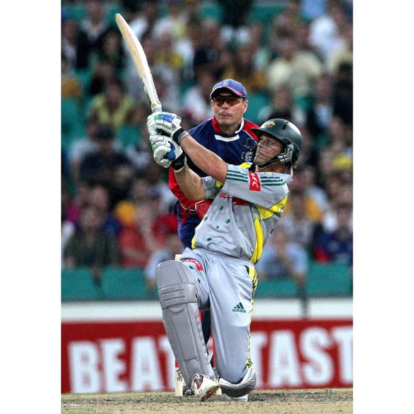 Adam Gilchrist hits a six against England during the Twenty20 cricket match between England and Australia at the Sydney Cricket Ground | TotalPoster
