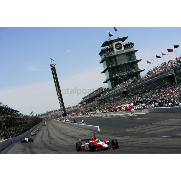 Dan Wheldon on his way to victory in the 89th Indianapolis 500 | TotalPoster