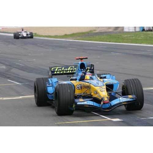 Fernando Alonso crosses the line to win the European Grand Prix at the Nurburgring | TotalPoster