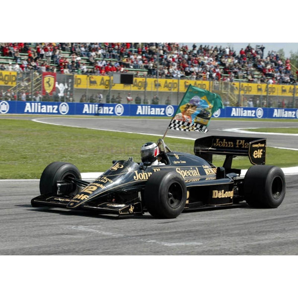 Gerhard Berger drives Ayrton Senna`s old Lotus F1 car during a tribute to the former champion before the San Marino Grand Prix at Imola | TotalPoster