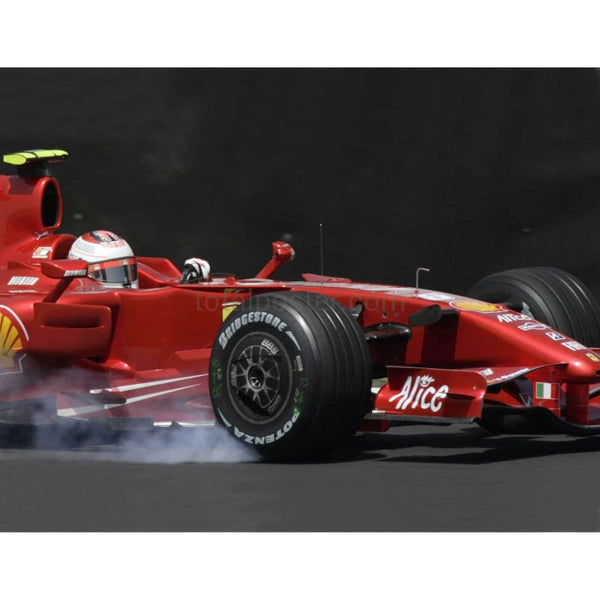 Kimi Raikkonen Ferrari locks a wheel during Brazil F1 Grand Prix | TotalPoster
