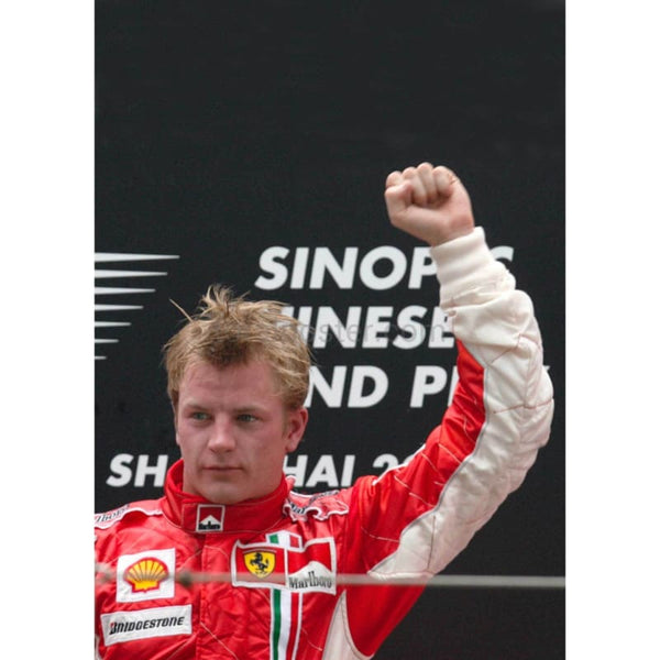 Kimi Raikkonen / Ferrari F1 celebrates on the podium after victory in the Grand Prix of China | TotalPoster