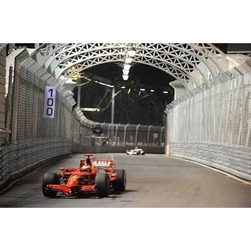 Kimi Raikkonen / Ferrari F1 during the first F1 night race at the Singapore Grand Prix | TotalPoster