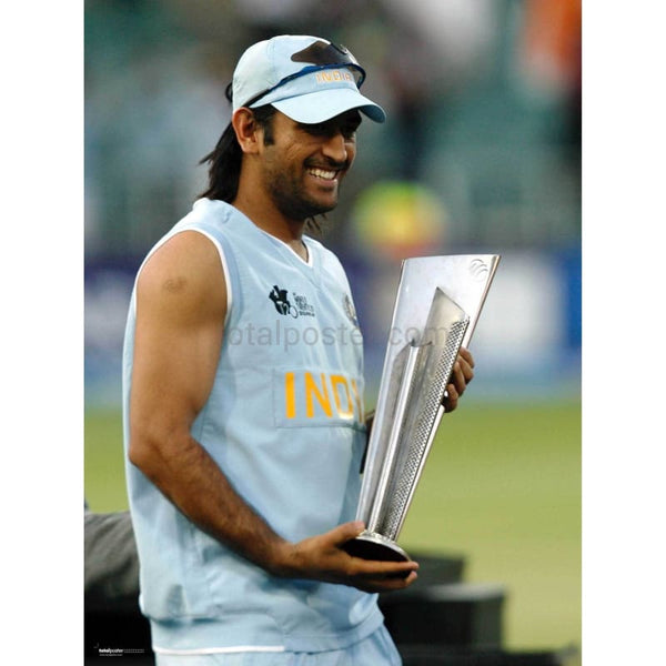 Mahendra Dhoni holds the ICC World Twenty20 trophy after his team defeated Pakistan in the final cricket match in Johannesburg | TotalPoster