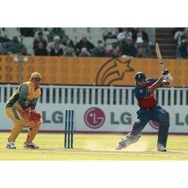 Michael Vaughan in action as wicket keeper Adam Gilchrist looks on during England v Australia ICC Champions Trophy 2004 Semi Final at Edgbaston | TotalPoster