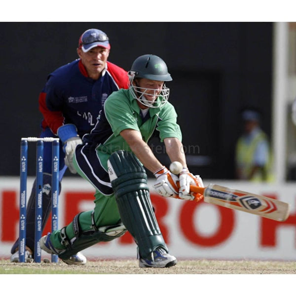 Ireland`s Niall O'Brien plays a shot as England`s wicketkeeper Paul Nixon watches during their World Cup cricket Super Eights match in Georgetown | TotalPoster