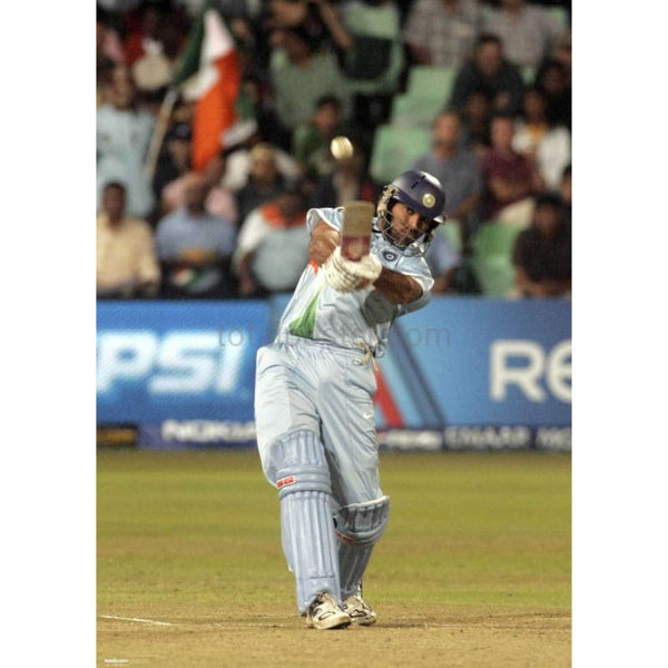 Yuvraj Singh hits a shot during the ICC World Twenty20 cricket match between India and England | TotalPoster